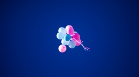 蓝色背景下的一串蓝红气球