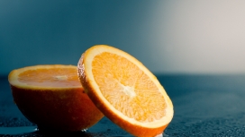 切开的橙片水果壁纸