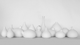 瑞典设计师Jomi Evers作品-装满水膨胀的白色陶罐设计