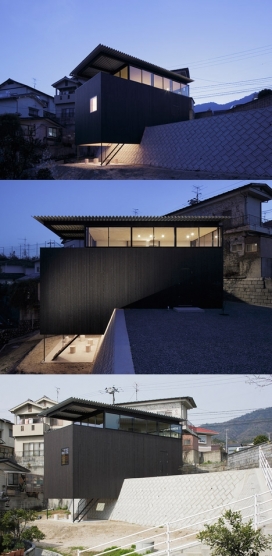 府宅-大野雄的黑木房子-坐落在广岛一个倾斜混凝土悬崖上，采用熏黑的木质，面积达93平方米，有一个四米高的护分开墙，十分适合居住