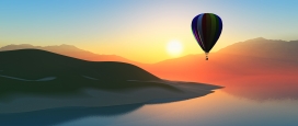 日落湖上空的热气球倒影美景