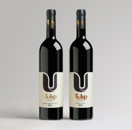 以色列郁金香高档葡萄酒瓶包装设计-新的清洁和简约的品牌标识，一个简单的视觉语言，用一个占主导地位的图形元素，其独特的造型，产生流动性和优雅的轮廓，并产生了富有美感的暗色调的对比