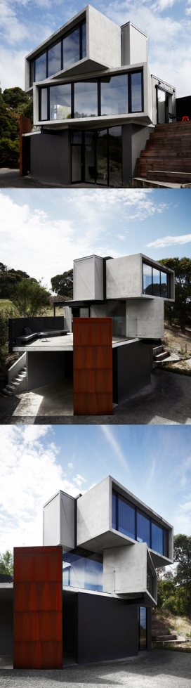 https://www.2008php.com/澳大利亚交叉箱度假房屋建筑设计-坐落在一个陡峭上，可以俯瞰澳大利亚维多利亚州的海洋，设计师采用堆叠的凝土和木材箱架为材料，创造了一个雕塑形式的建筑，三面有阳台，全景室内观赏区，居民可以在一天的不同区域享受阳光。