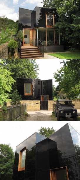 黑色玻璃幕墙树屋-在法国南部，设计了五间卧室的房子，有一个漂亮的蝴蝶屋顶