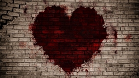 砖块墙上的红色爱心