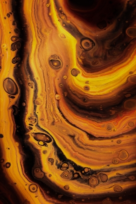 金褐色的液体褶皱抽象图
