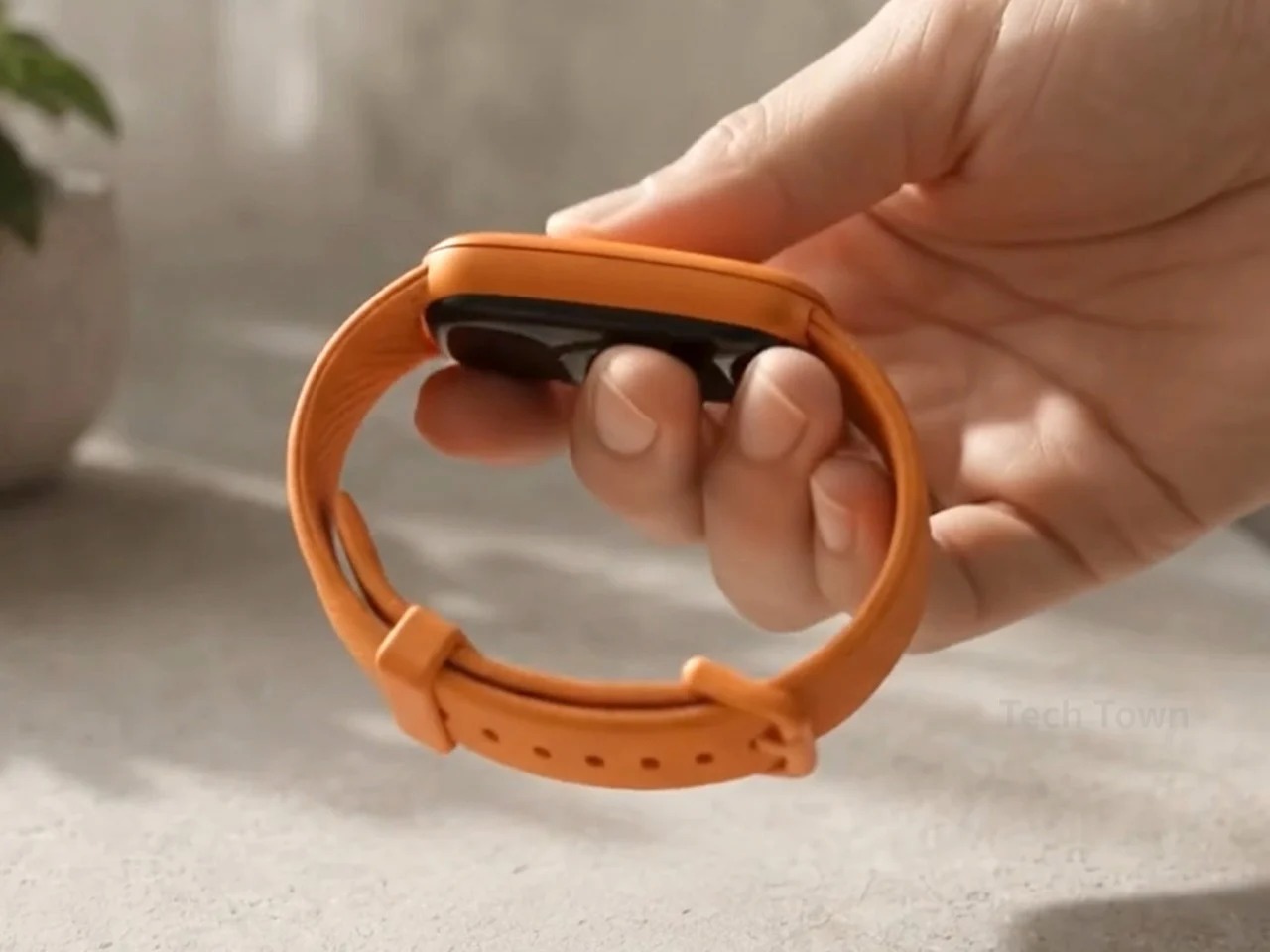 苹果可能会推出一款“WATCH AIR”无屏健康追踪器,与whop和FITBIT AIR竞争---酷图编号1